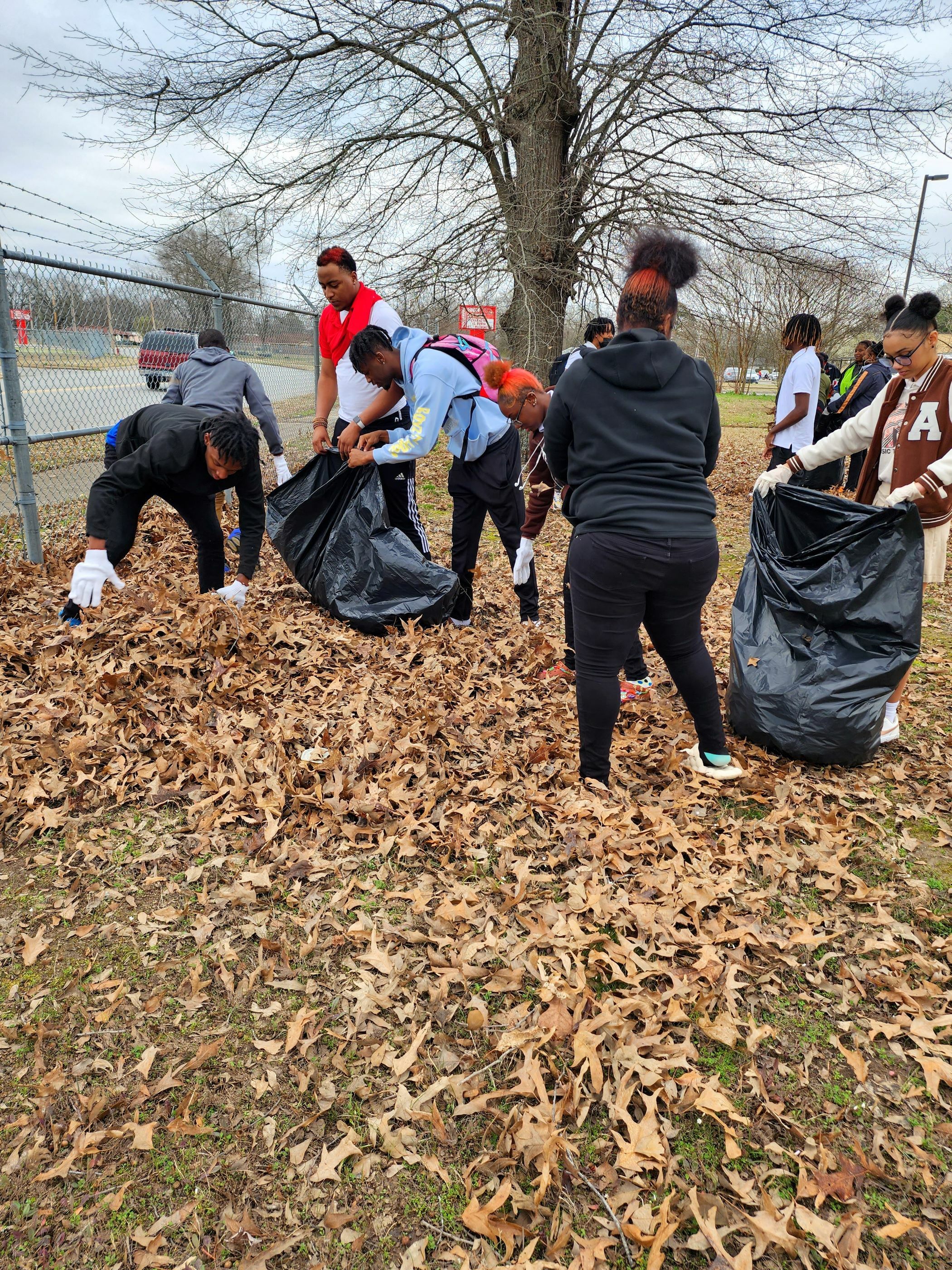 TyKesha Cross' students cleaning up the community.