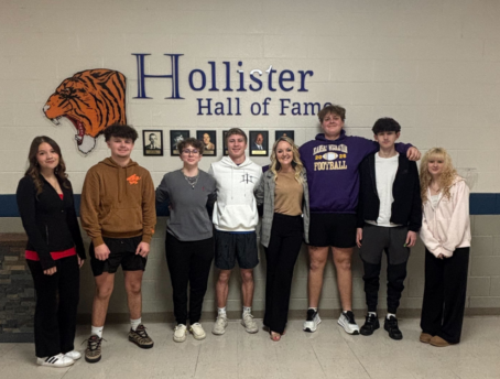 Hollister High School students and Principal Dr. Christina Smith pictured in front of the Hollister Hall of Fame