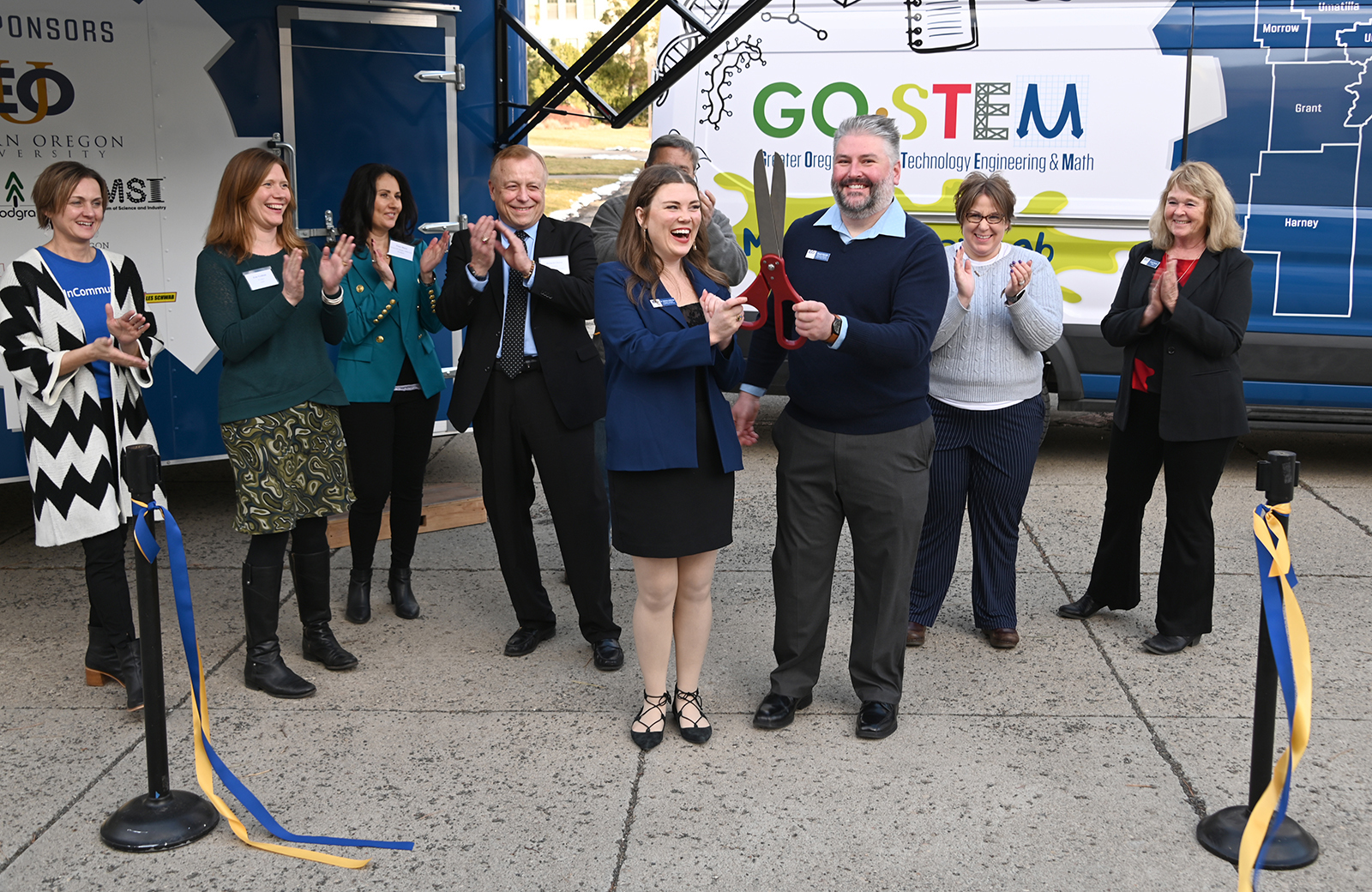 Stefanie Holloway, GO STEM Program Director (Left) and David Melville, GO STEM Executive Director (Right) officially launch the Mobile Maker Lab.