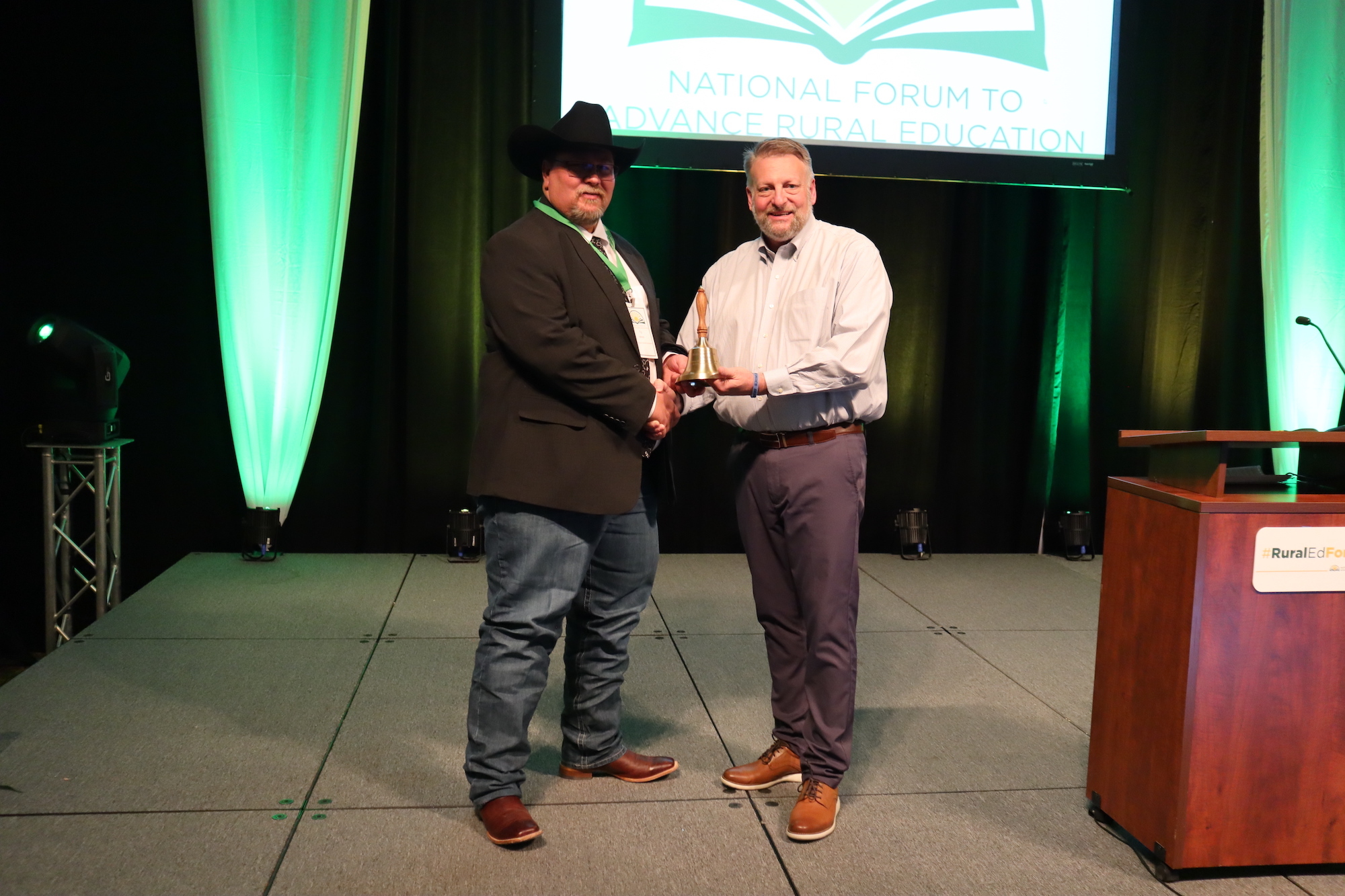 Ty receiving the National Rural Teacher of the Year Award from Dr. Allen Pratt